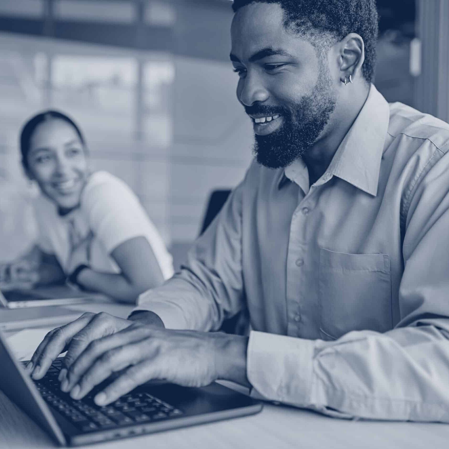 Business man working on laptop in modern office